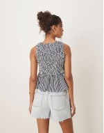 shirred top with peplum and front bows in navy white stripe