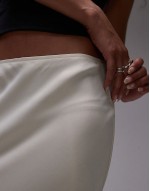 Satin bias maxi skirt with diagonal lace insert in champagne