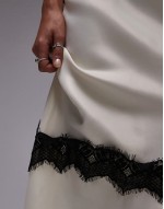 Satin bias maxi skirt with diagonal lace insert in champagne