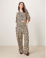 cropped shirt and trousers co-ord in animal print